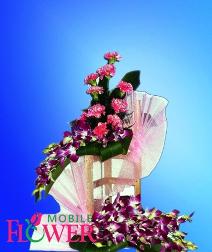 orchid n carnation arrangement / mobile flower pune